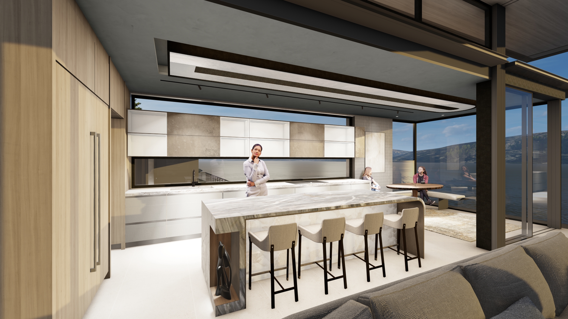 Modern open kitchen with marble island and bar stools, woman chef standing at island, large windows overlook water and hills.